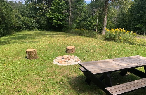 Campbellsport Apartment | GGG Log Cabin Apartment on the Ice Age Trail