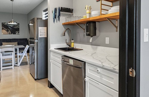 Pacific Hotel | Group suite with full kitchen and laundry on the second floor of The Landing Hub Hotel