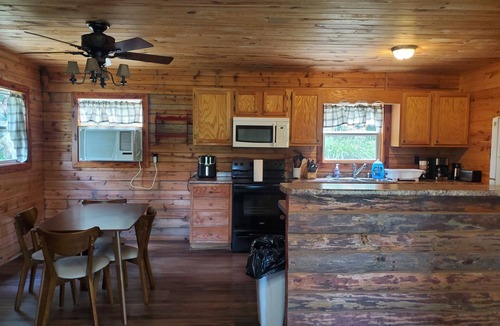 Ironton Cabin | Hidden Hollow Cabin. Charming 2-bedroom cabin on a beautiful lake.