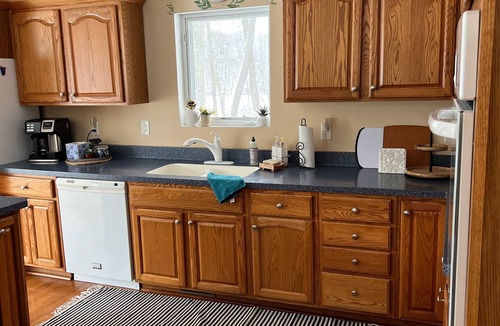 Delton House | Idyllic, Waterfront Home on Crooked Lake with 2.5 Wooded Acres