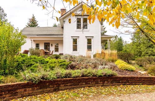 Fennville House | Inviting farmhouse for your family getaway, minutes from beaches. Pet friendly!
