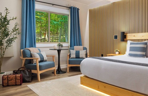 Rapid City Hotel | King Room Near Torch Lake | Hot Tub, Sauna, Resort Amenities