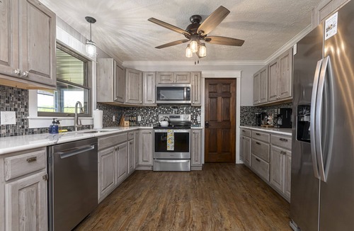 Wolf Creek House | Lakefront 5BR · Dock, Kayaks, Hot Tub & Beach