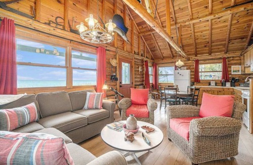 Empire House | Lakefront cabin with 100 ft of Lake Michigan beach, full kitchen, loft, & deck
