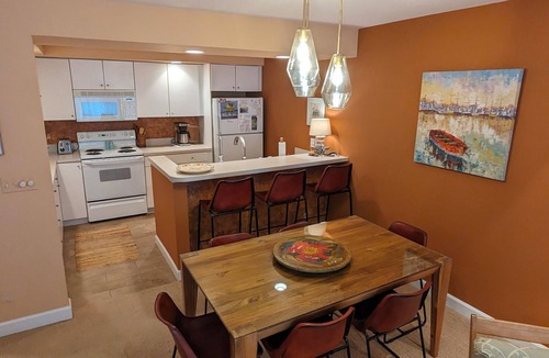 Maple City House | Lakefront condo on Lake Michigan. Fireplace. A/C. Beautiful resort setting.