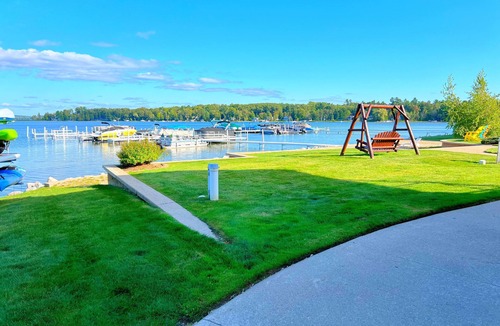 Conway Condo | Lakefront Condo w/Private Boat Dock on Crooked Lake- Petoskey & Harbor Springs