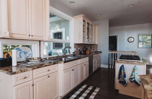 Central Lake House | Lakefront Escape | Hot Tub, Dock + Sleeps 14 | Perfect for Groups