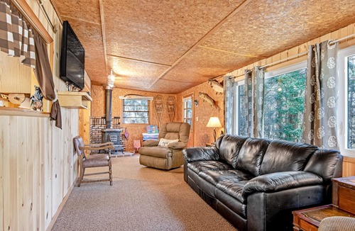 Presque Isle Cabin | Lakefront Getaway W/ Firepit, Free WiFi, Dock, & Large Deck - Dogs Welcome