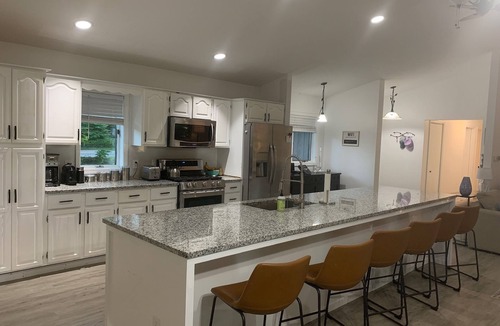Whitehall House | Large Lake House on Triple Lot With Huge Treed Deck Overlooks Water