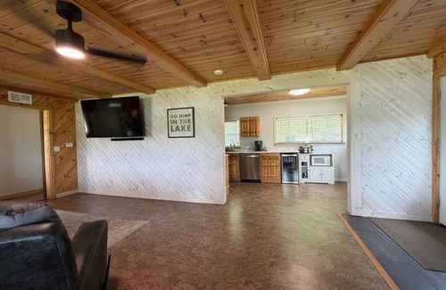 East Jordan House | Lazy Loon, Waterfront, Water Toys, Pontoon, Pets