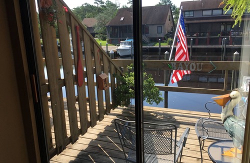 Slidell Condo | LONGER TERM RENTAL ONLY! Waterfront 3 Bedroom On the Bayou/Private Boat Slip!