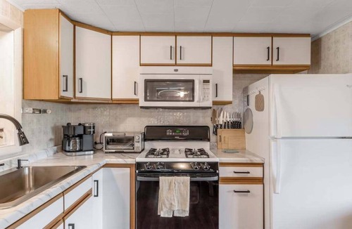 Mercer House | Lovely home with Mercer Lake view, patio, full kitchen, on trail 17