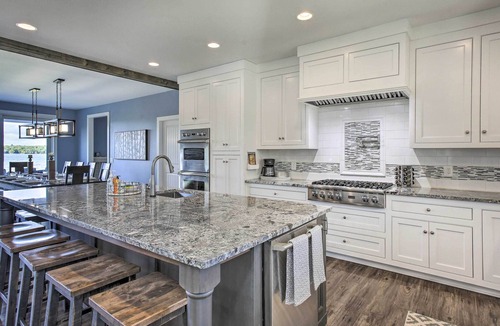 Maple City Cottage | Luxe Lakefront Escape w/ 4 Kayaks, Hot Tub, Beach!