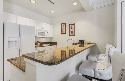 Bay Harbor Condo | Luxurious King Suite 364 in Bay Harbor, perfect for couples, with stunning village views.