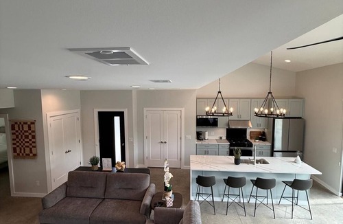 Stevensville House | Modern Luxury escape with Heated Pool, Hot Tub, Fire Pit, State Park and Beaches