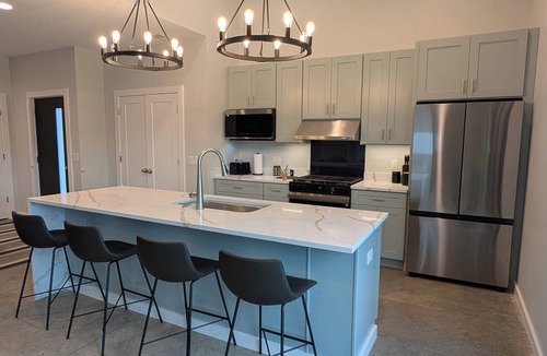 Stevensville House | Modern Luxury escape with Heated Pool, Hot Tub, Fire Pit, State Park and Beaches