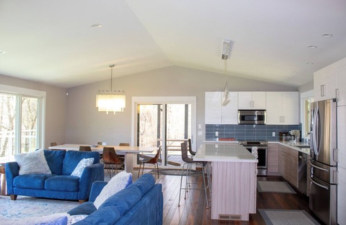 Aitkin House | Modern retreat on Cedar Lake- quiet wooded lot with beautiful lake view!