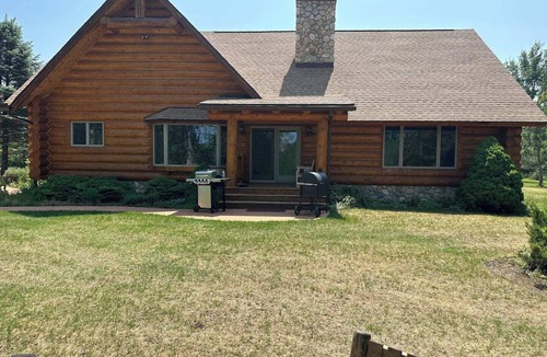 Grayling Cabin | Montana Built Log Cabin built just feet away from the North Branch of the AuSable River. Experience the 100 year old, untouched, cedar forest as well as the plentiful critters that reside there.