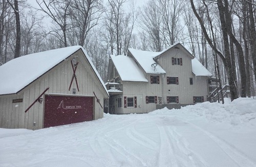 Stambaugh House | Mountain View Lodge - 3 story house in Ski Brule Village with 2 hot tubs & sauna