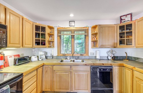 Rapid City Cottage | Near Beach Access: Torch Lake Cabin Retreat!