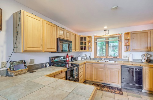 Rapid City Cottage | Near Beach Access: Torch Lake Cabin Retreat!
