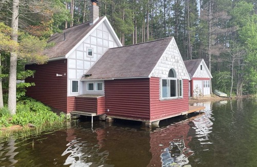 Wetmore Cottage | Near Munising snowmobile trails. Ride out from the property