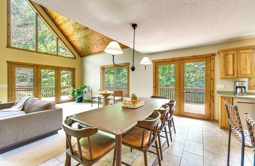 Amery House | New Listing! Timber Ridge Lake House is a private home in Amery Wisconsin on Lake Wapogasset/Bear Trap. The home balances the warmth of a large A-Frame with modern decor and finishes providing a serene stay with woods and lake views.