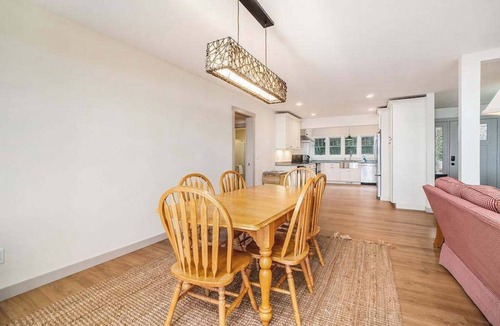 Lake Township House | Newly remodeled lake house with amazing views, dock, firepit & vibrant interior
