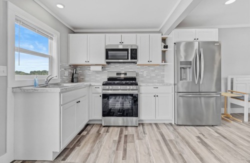 Six Lakes Cottage | Peaceful 2-bedroom cottage on beautiful First Lake in Six Lakes, Michigan.
