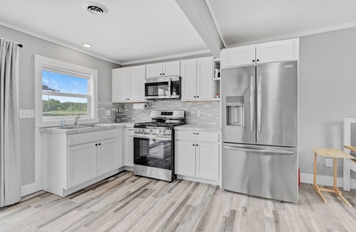 Six Lakes Cottage | Peaceful 2-bedroom cottage on beautiful First Lake in Six Lakes, Michigan.
