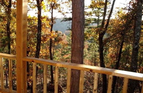 Blue Eye Cabin | Peaceful and Spacious Log Cabin Rental with Woodland Views near Branson, Missouri