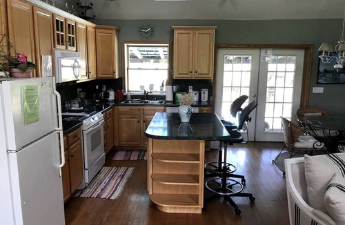 Crofton Cabin | Pet-Friendly Log Cabin with an Outdoor Pool near Crofton, Kentucky
