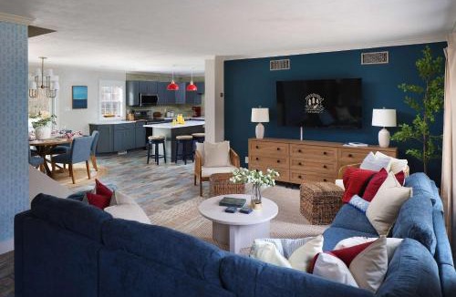 Muskegon House | Pine & Paddle Getaway Game Room Hot Tub Pool