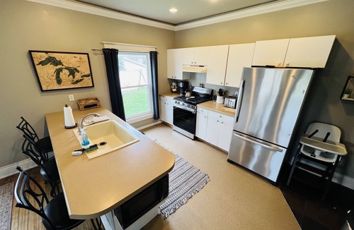 East Jordan House | Private DOCK Lake Charlevoix/Pontoon Boat & Golf-Cart/RV Parking/Sleeps 14