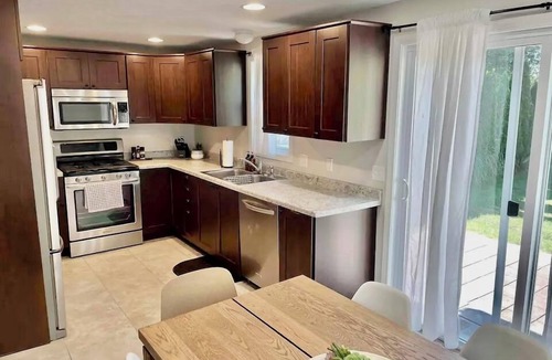 Kutzky Park House | Recline and Reset - Main Floor Bed/Bath w/lift chair, Edge of Mayo Campus