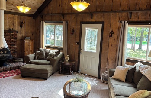 Houghton Lake Cabin | Rustic Retreat- This cabin in the woods is the perfect getaway!