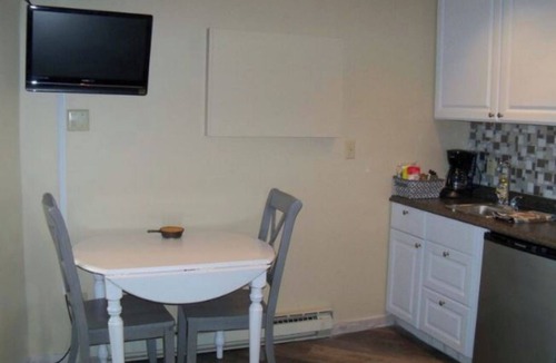 Mancelona Condo | Schuss Village=COZY condo, sleeps 4. Close to LAKES, golf, pools, boat parking