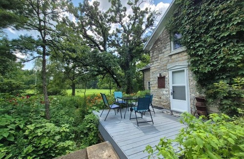 Decorah House | Secluded 1860 Stone House recently remodeled on the Upper Iowa River by Bluffton