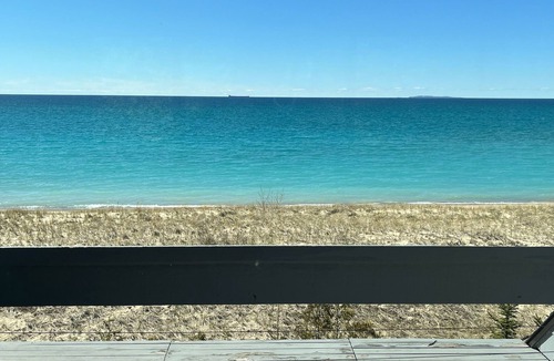 Northport Cottage | Secluded beachfront cottage in Northport with stunning sunsets on Lake Michigan