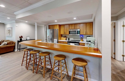 Maple City House | Secluded home with three kitchens, vaulted ceilings, washer/dryer, & patios