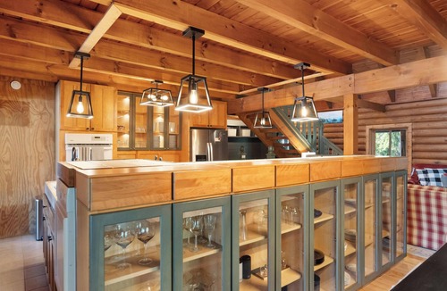 Charlevoix Ski Chalet | Secluded, log cabin chalet 16+ custom outdoor fire pit, air hockey, 2 hot tubs!