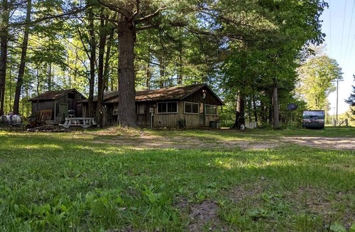 Dickson Township Cabin | Secluded Rustic Cabin Rental Inside Manistee National Forest in Brethren, Michigan