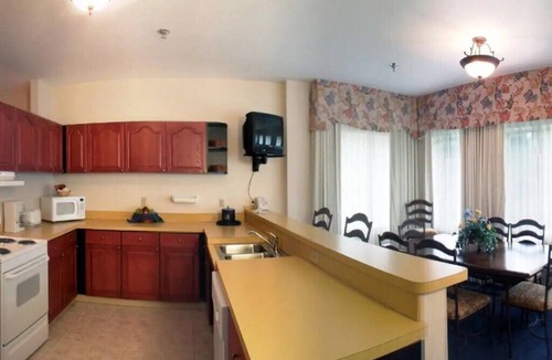 Mishawaka Villa | South Bend | Fan Basecamp | Pool + Hot Tub