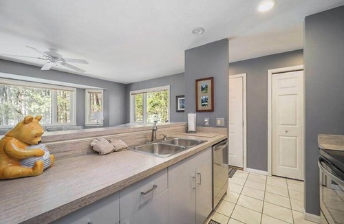 Maple City House | Spacious home with studio, lake access, sunroom, fireplace, W/D, & central AC