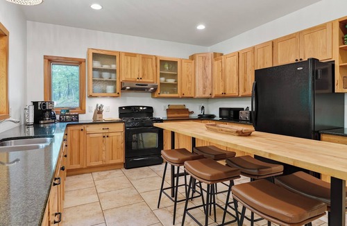 Jacksonport Cabin | Spacious Jacksonport Woodland Cabin: Screened Porch, Near Cave Point & Lake Park