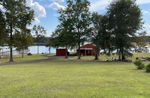 Negreet House | Super clean Waterfront home with private boat launch and fishing pier on site.