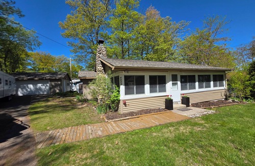 Higgins Lake Cottage | The ultimate lakefront escape right on the shores of beautiful Higgins Lake!
