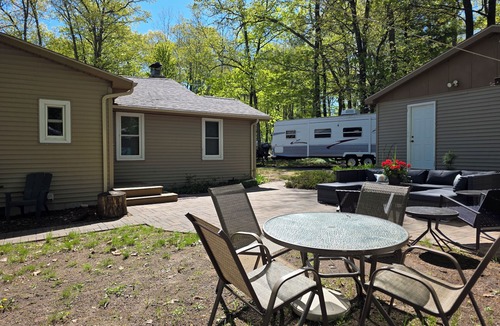 Higgins Lake Cottage | The ultimate lakefront escape right on the shores of beautiful Higgins Lake!