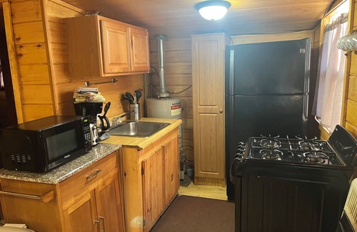 Lac La Belle Cabin | Timeless Nostalgic Resort Cabin Steps from the water and campfire nights!