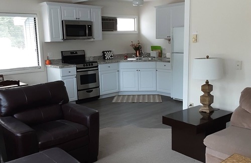 Rapid City Cottage | TORCH LAKE SANDBAR -directly across the street-